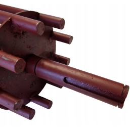 Būgnas su voleliu, varantis drugelio dalgio barstytuvą