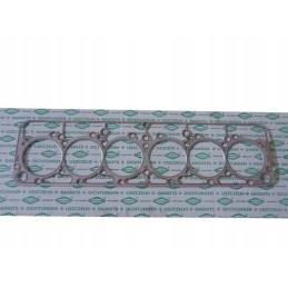 Baltai klijuota variklio galvutės tarpinė