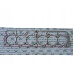 Baltai klijuota variklio galvutės tarpinė