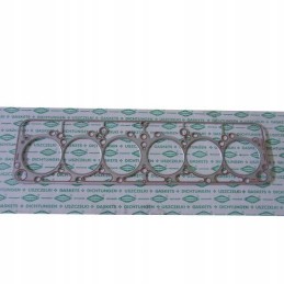 Baltai klijuota variklio galvutės tarpinė