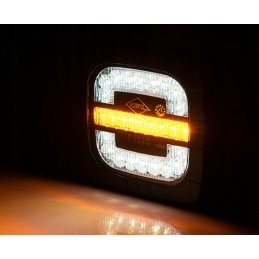 Kombinuotas priekinis žibintas su traktoriaus laikikliu