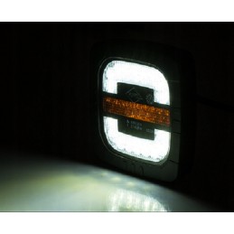 Kombinuotas priekinis žibintas su traktoriaus laikikliu