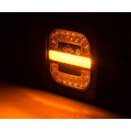 Kombinuotas priekinis žibintas su traktoriaus laikikliu